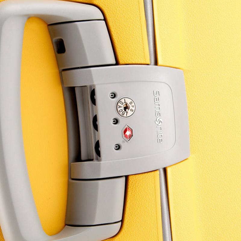 Yellow samsonite luggage